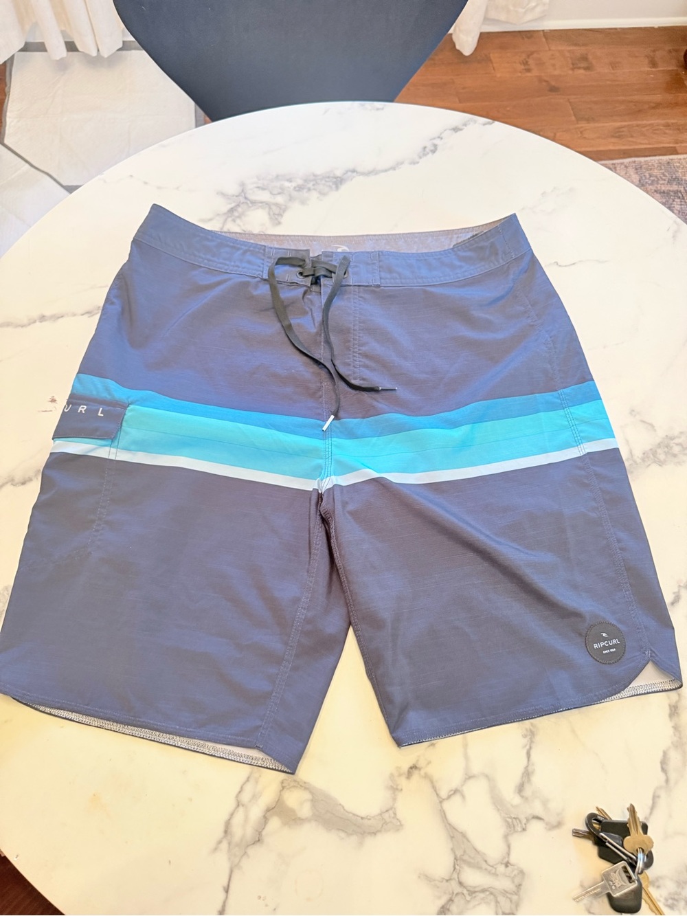 Rip Curl Navy Board Shorts with Aqua and Light Blue Stripes